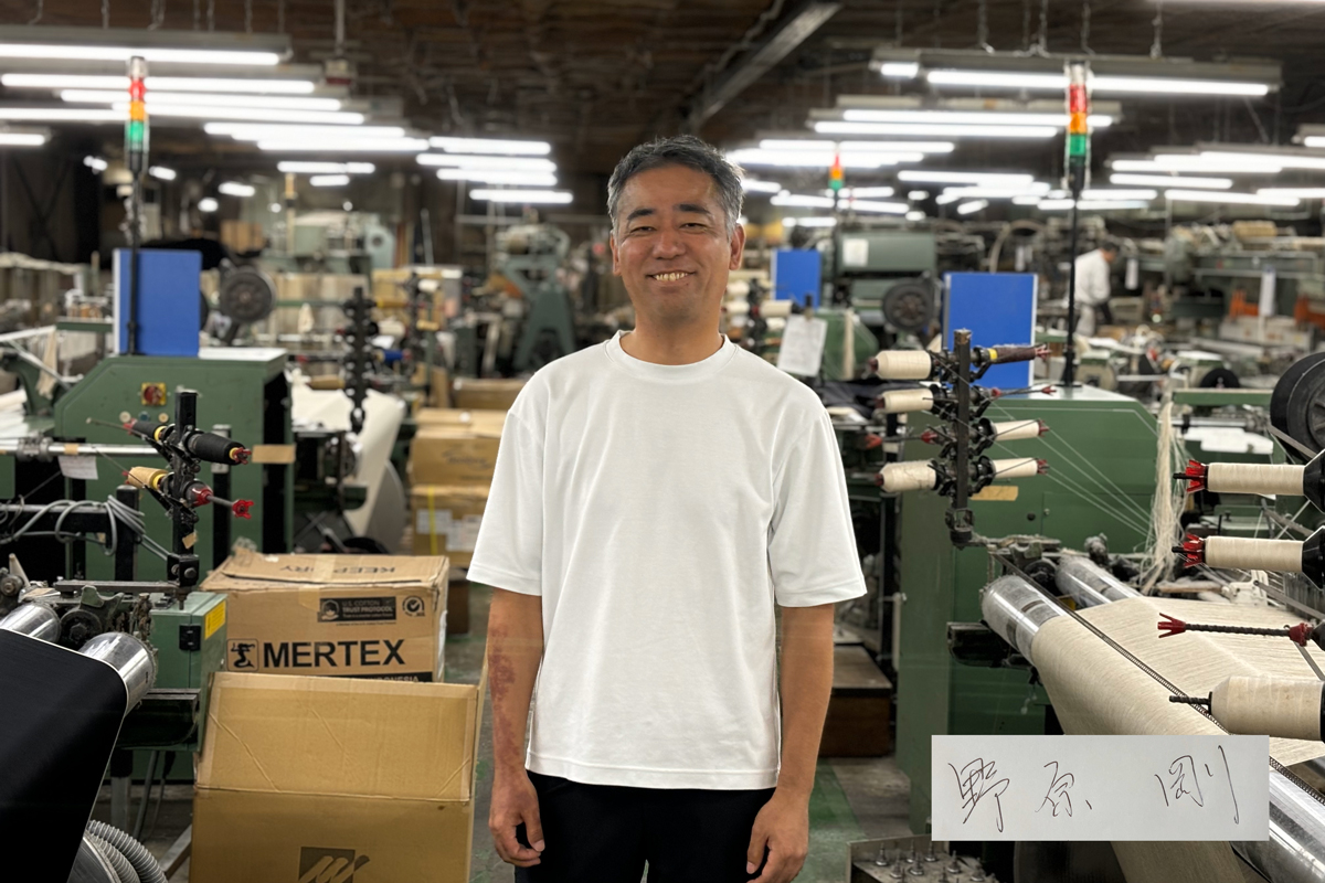 「先染め・高密度」を一貫生産で作る、オンリーワンのコート生地